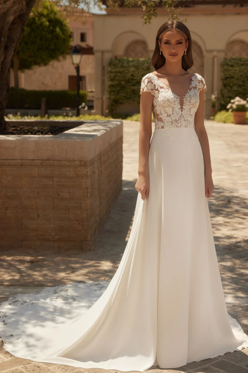 Robe de mariée bohème Turquoise, à essayer chez Monica Mariage à Seysses